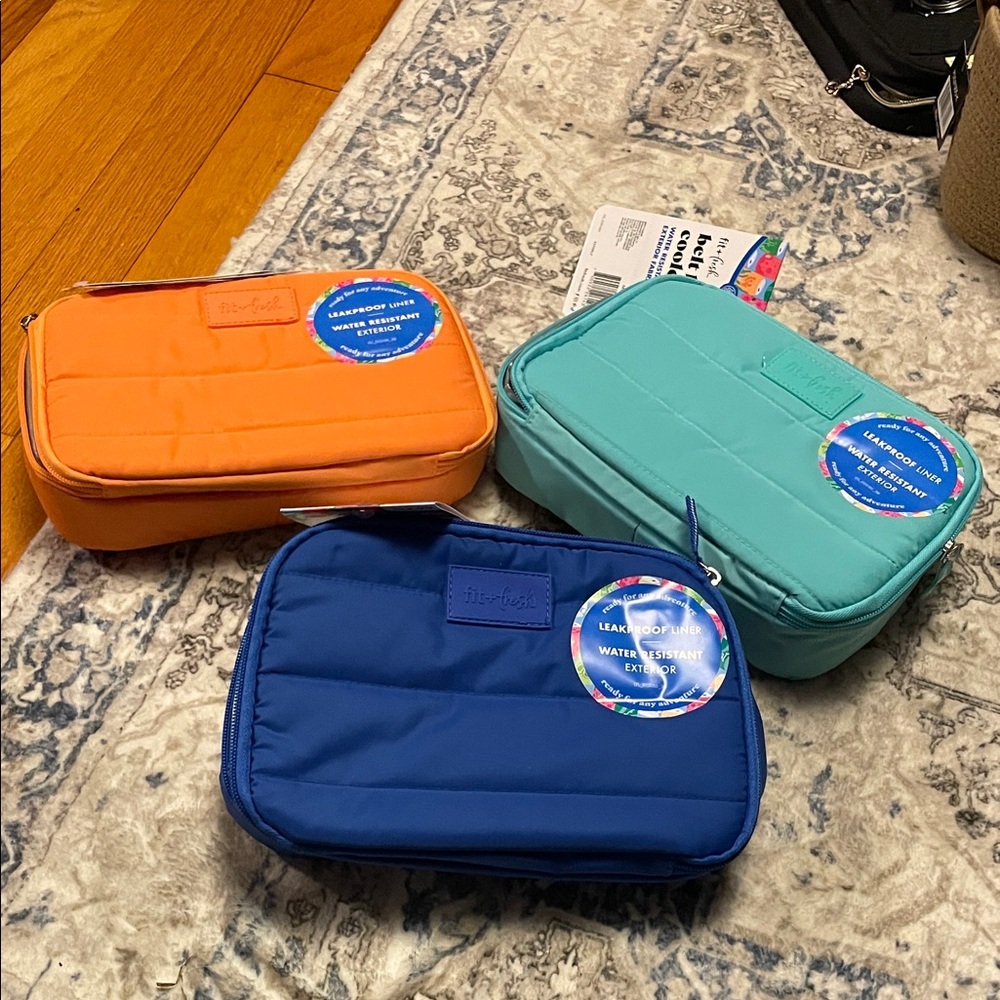 Orange, Blue, and Teal Travel Pouches